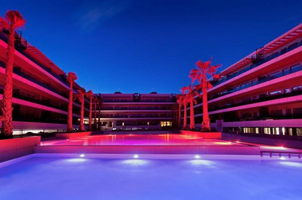 pool and complex at night